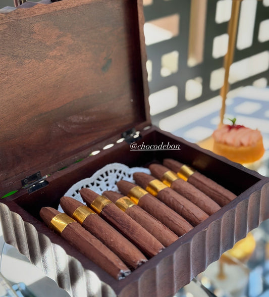 Chocolate cigar in a wood box