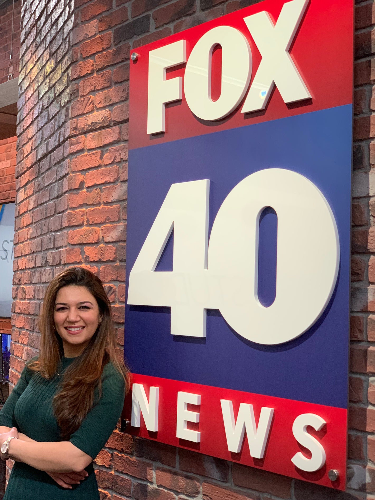 Noor with Fox40 News logo