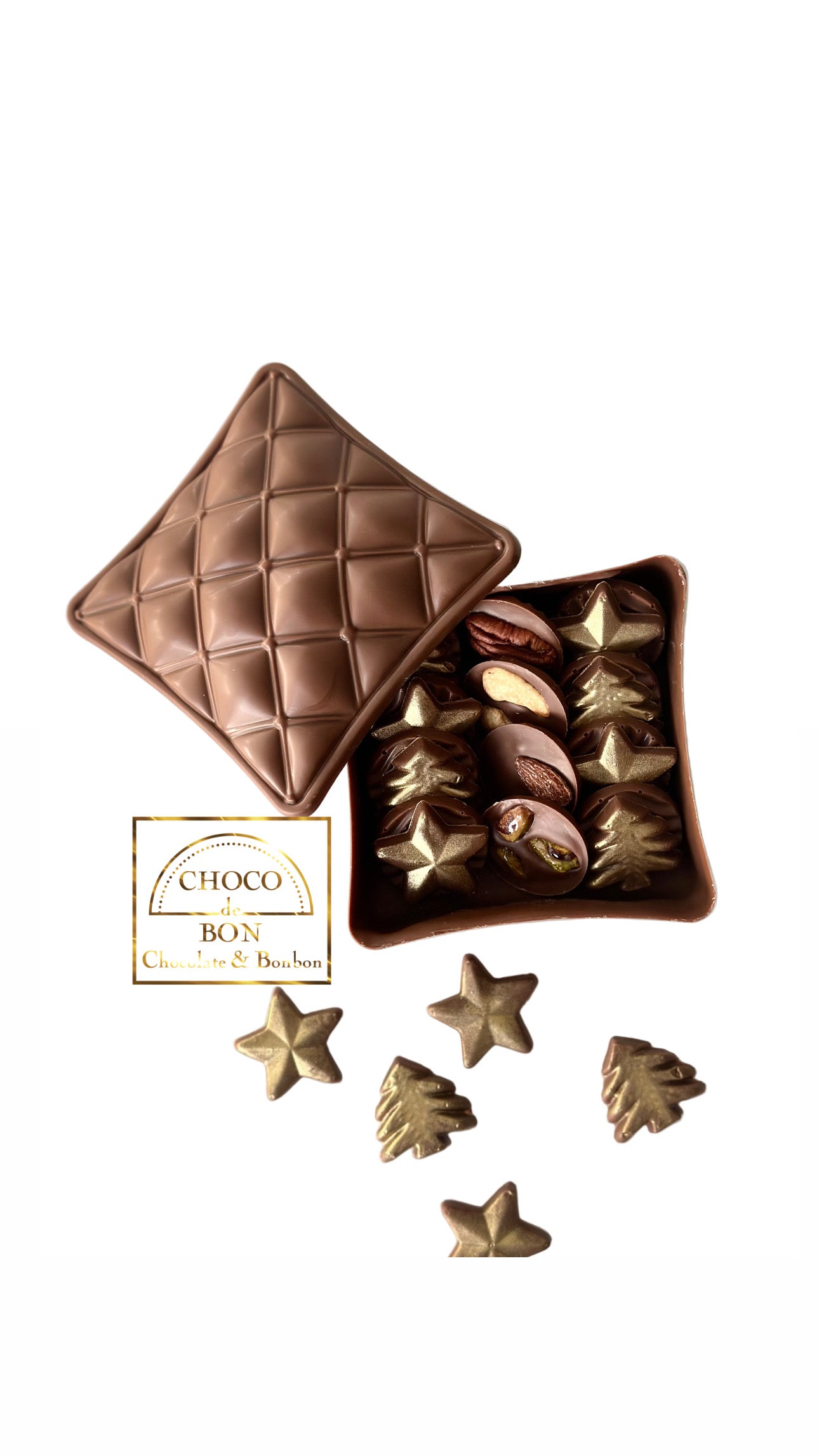 Open chocolate box with assorted chocolates and a Choco Bon logo on a white background