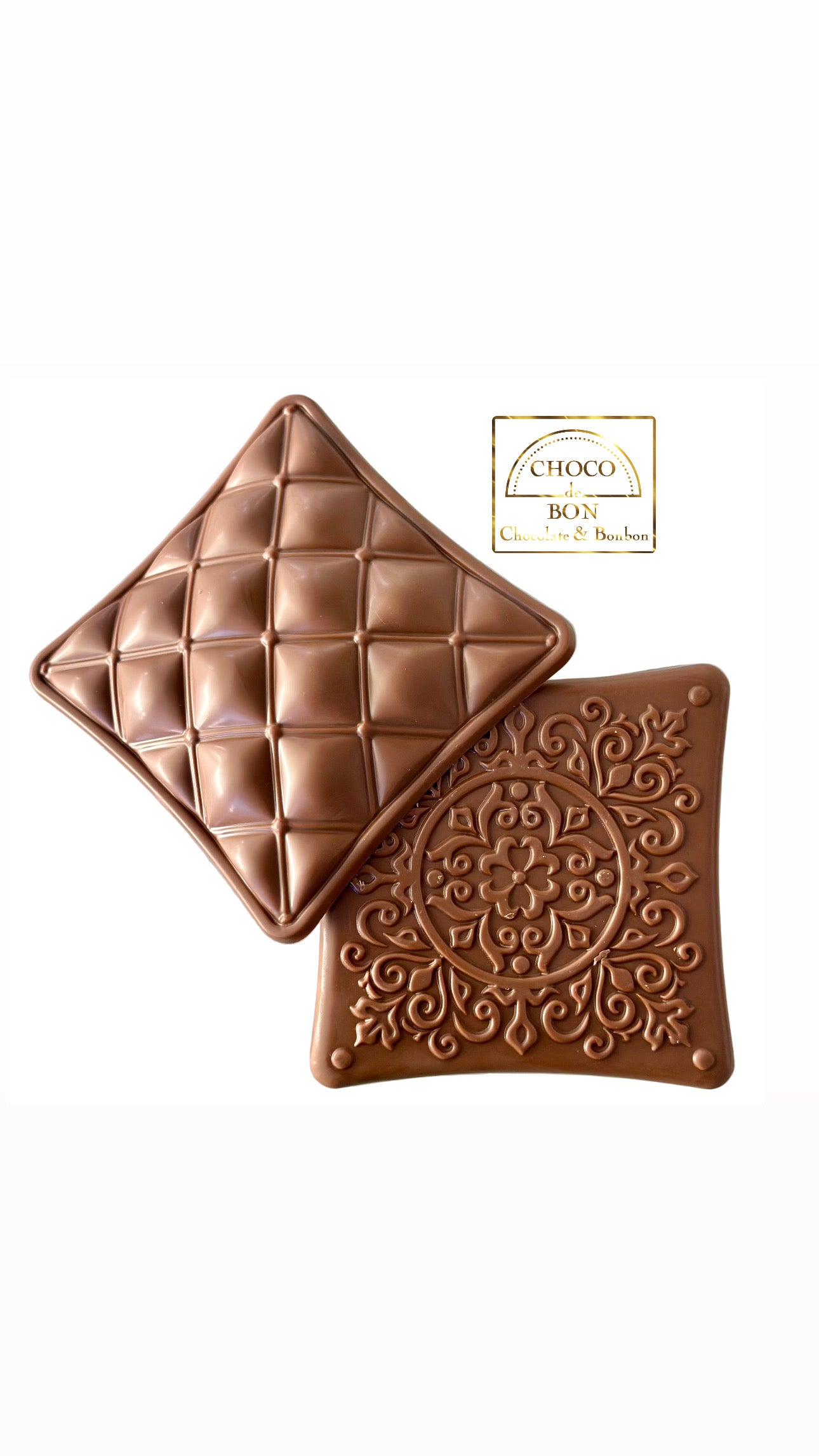Two chocolate boxes with embossed designs on a white background, featuring the Choco Bon logo.